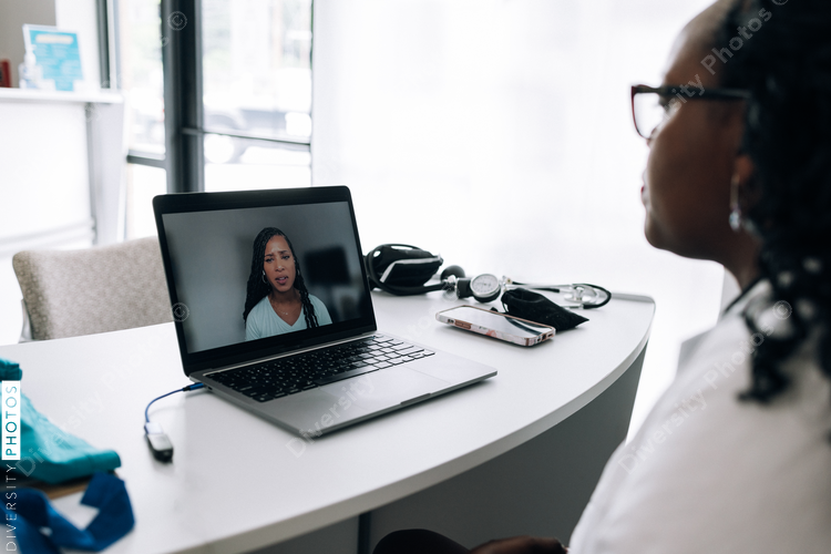 African American Doctor does virtual patient consulation, telehealth