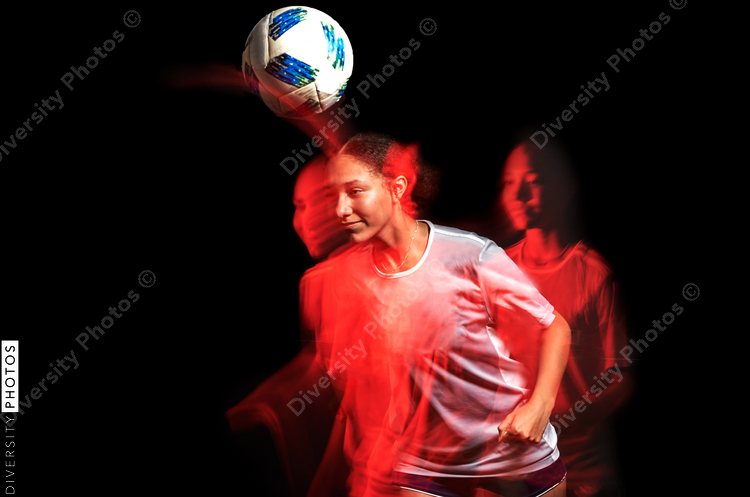Young female soccer player in motion colorful portrait