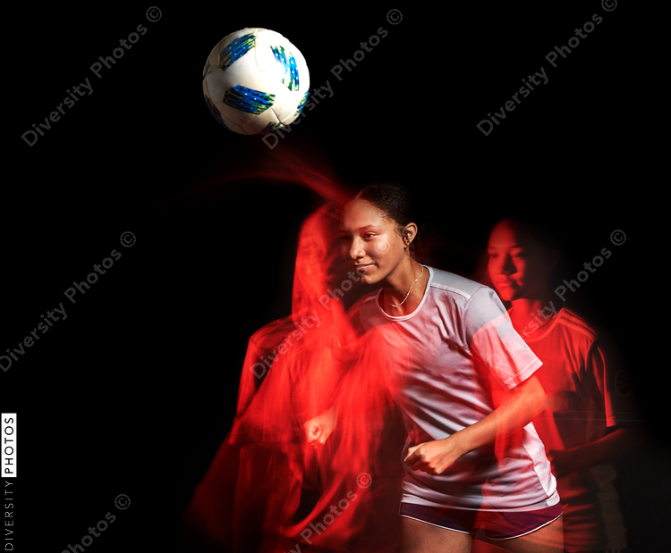 Young female soccer player in motion colorful portrait
