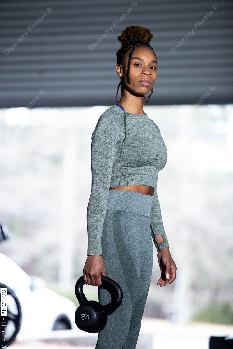 Portrait of Black fit woman in gym