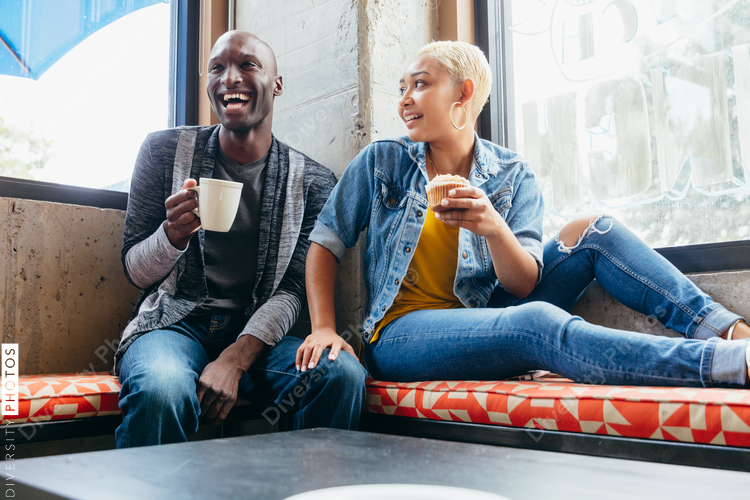 Colleagues talking at a cafe
