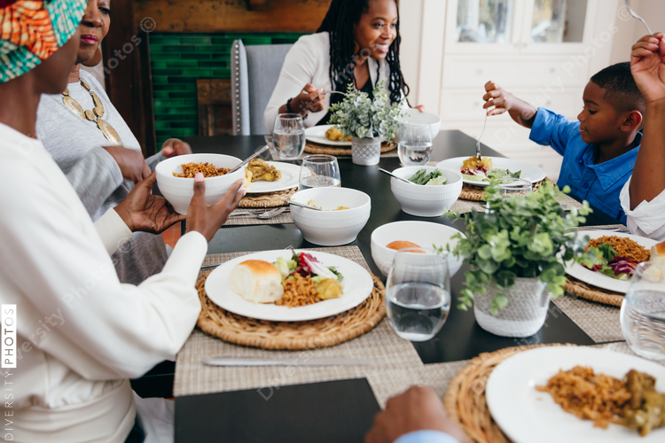 Family enjoying Kwanzaa dinner together