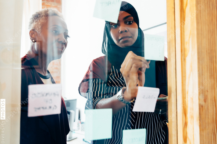 Diverse team brainstorming in meeting