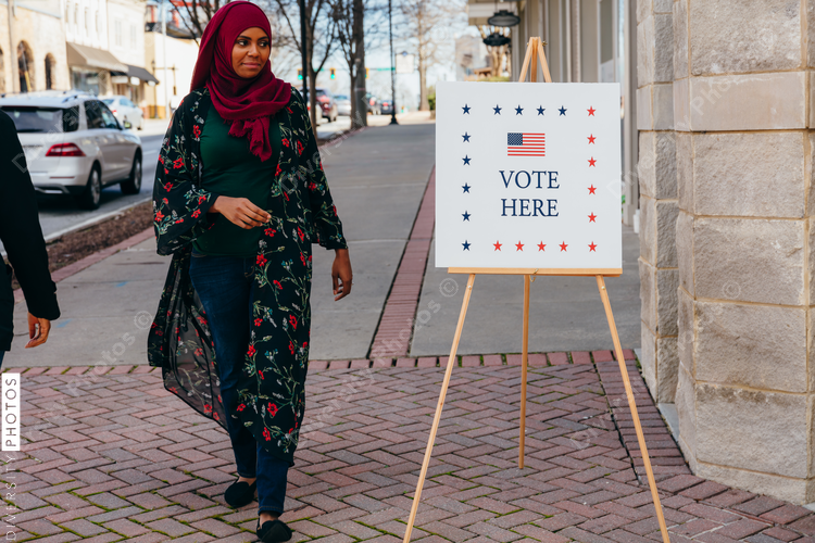 Woman entering polling place location