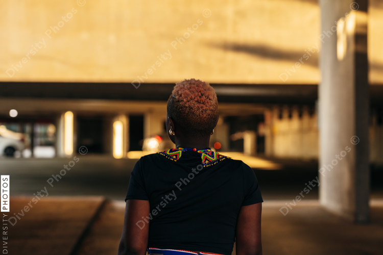 Young woman walks in the city