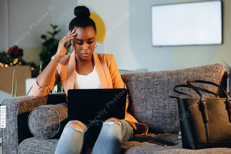 Young professional woman working at modern business office