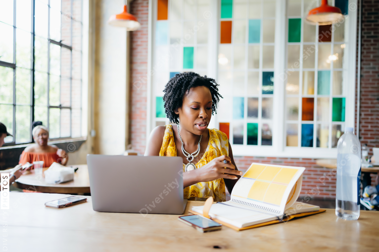 African American woman working at a local cafe