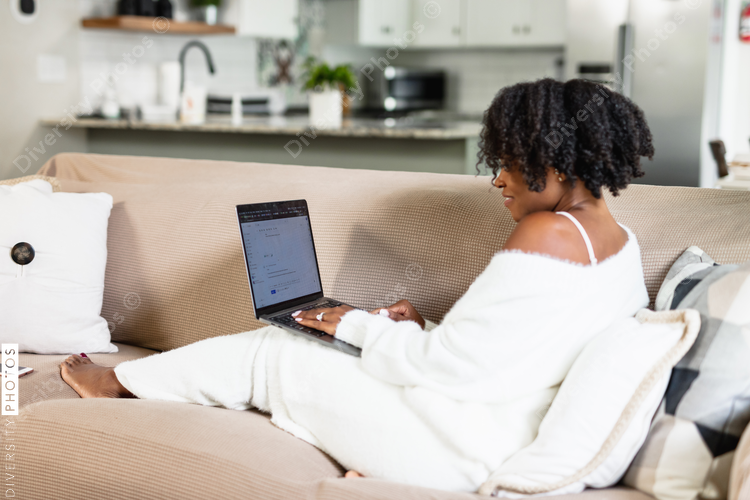 Black woman cozy, working from home