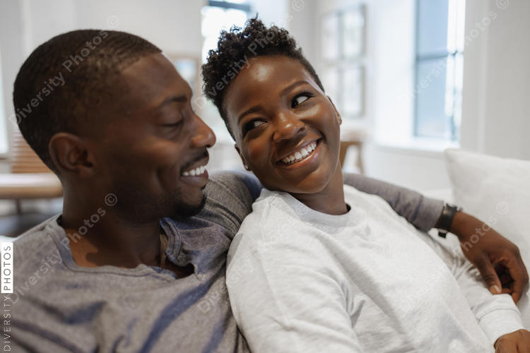 Black Couple smiling and embracing