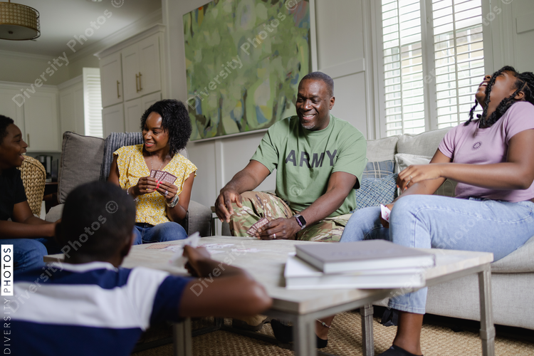 Family game night, black family laughing, having fun, connections