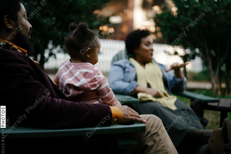Black friends safely gathered at backyard kickback party