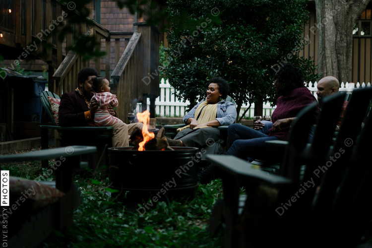 Black friends safely gathered at backyard kickback party