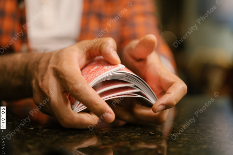 African American friends together playing card games