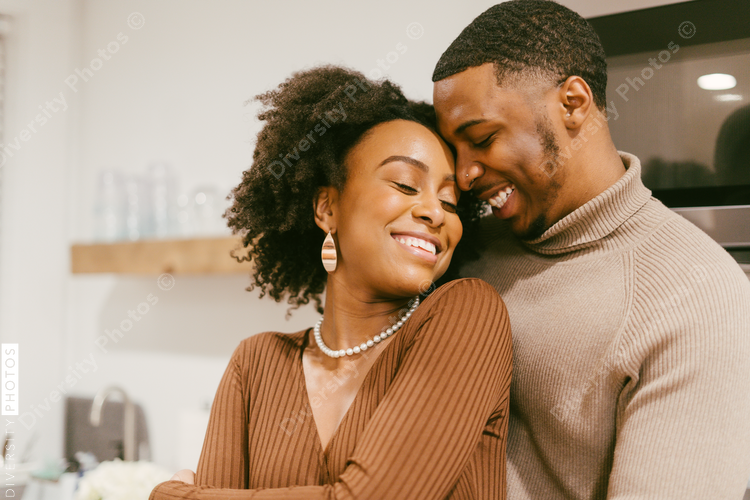 Couple embracing and celebrating relationship milestone, anniversary