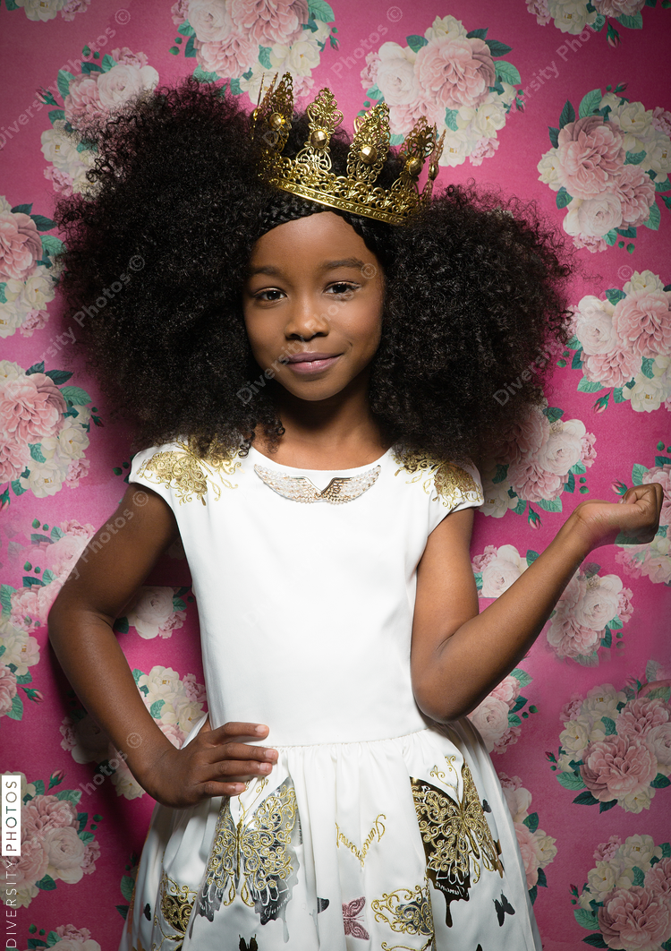 Portrait of smiling girl wearing crown