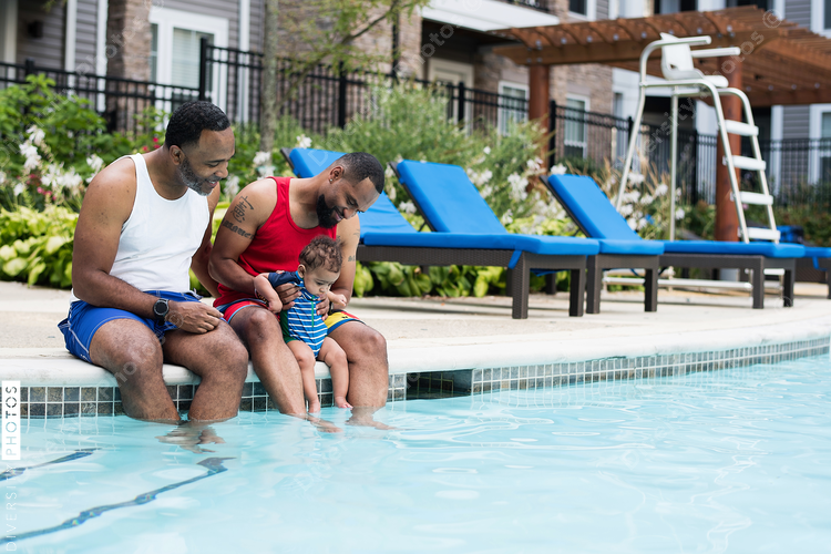 Family spending time at swimming pool