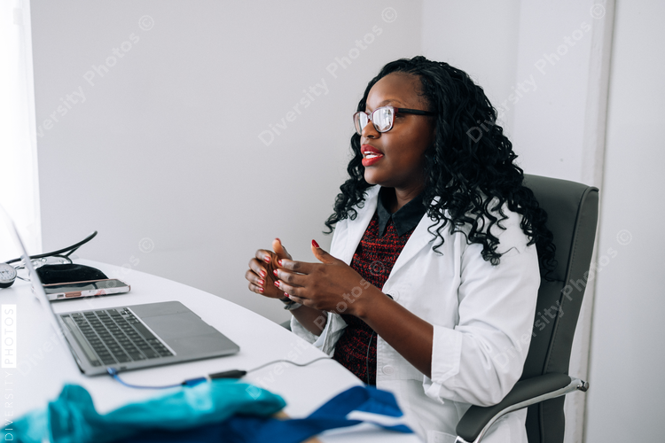 African American Doctor does virtual patient consulation, telehealth