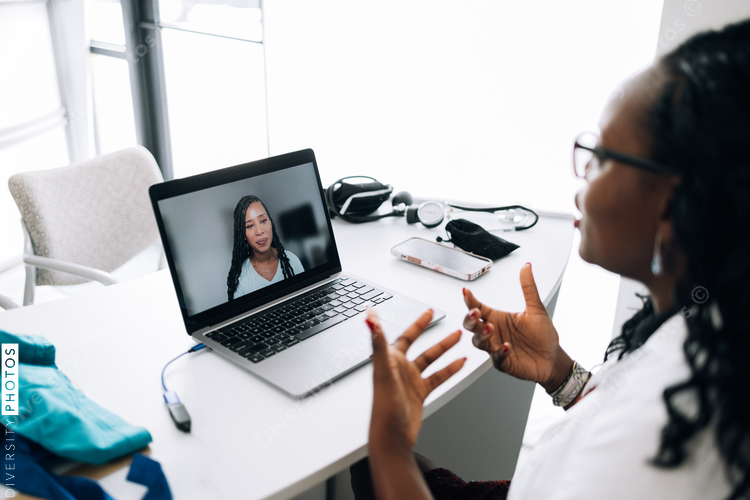 African American Doctor does virtual patient consulation, telehealth