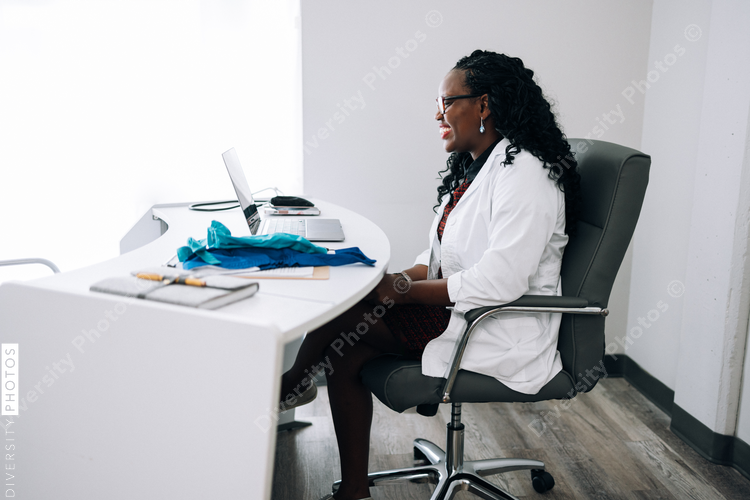 African American Doctor does virtual patient consulation, telehealth