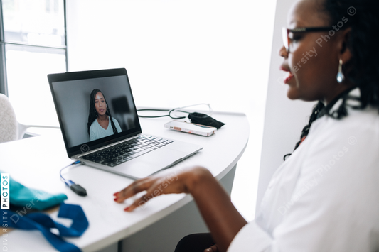 African American female Doctor does virtual patient consulation, telehealth