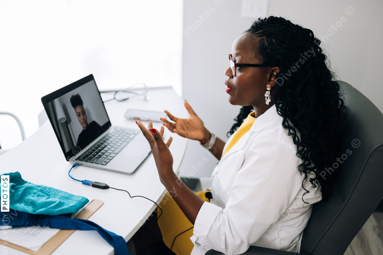 African American female Doctor does virtual patient consulation, telehealth