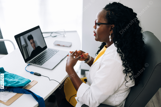 Black Doctor does virtual patient consulation, telehealth