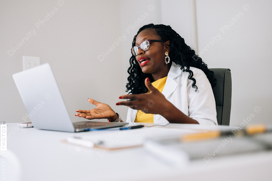 Black Doctor does virtual patient consulation, telehealth