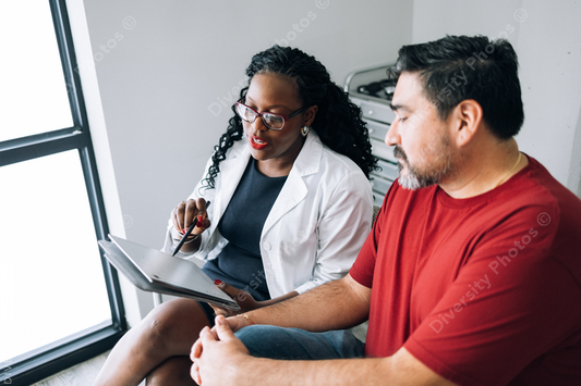 African American doctor consulting Hispanic patient
