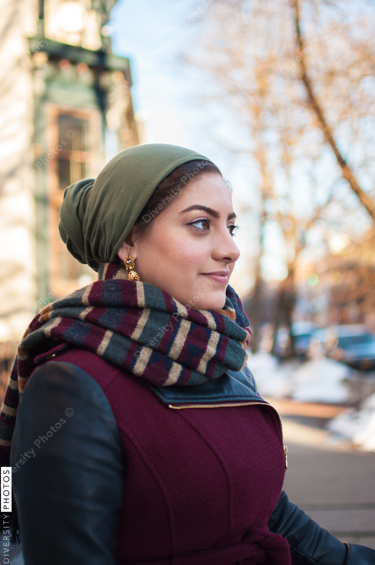 Portrait of young woman wearing scarf