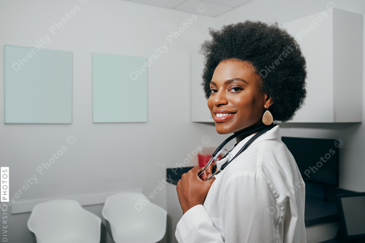 Portrait of pediatrician in her office, African American woman