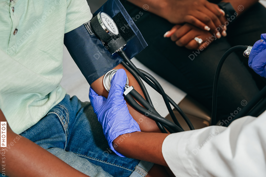 Black doctor Pediatrician examining patient