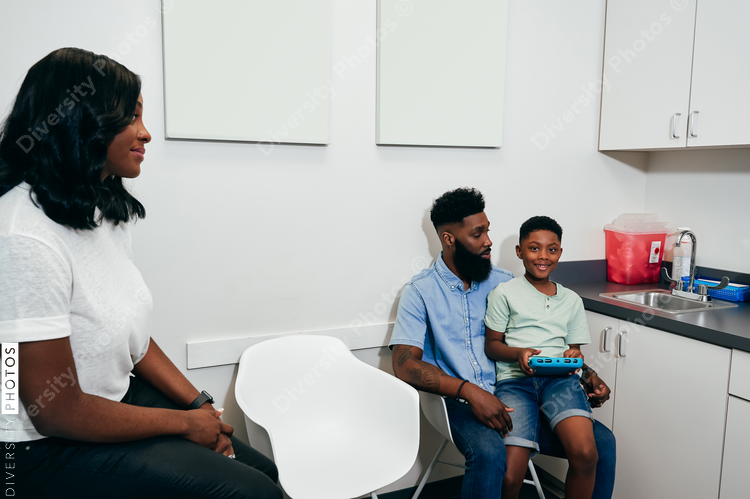 Family in pediatricians¬†office