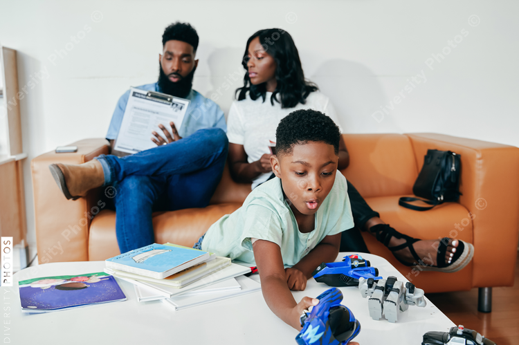 Black Family in clinic waiting room