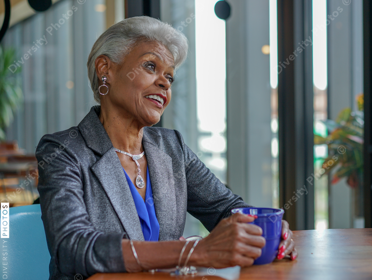 Senior woman sitting in cafe