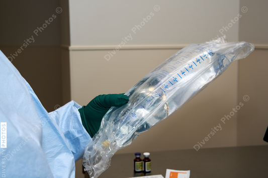 Black healthcare worker pharmacist preparing medicine