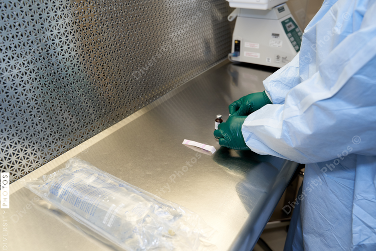 Black healthcare worker pharmacist preparing medicine