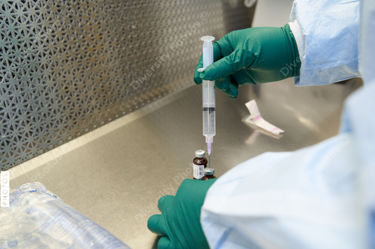 Black healthcare worker pharmacist preparing medicine