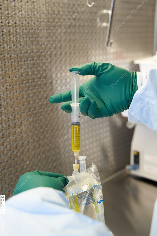 Black healthcare worker pharmacist preparing medicine
