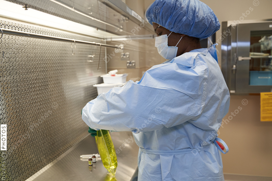 Black healthcare worker pharmacist preparing medicine