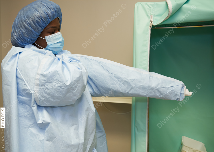 Black healthcare worker wearing PPE safety equipment