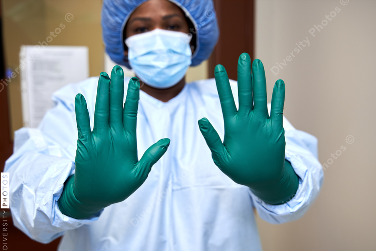 Black healthcare worker wearing PPE safety equipment