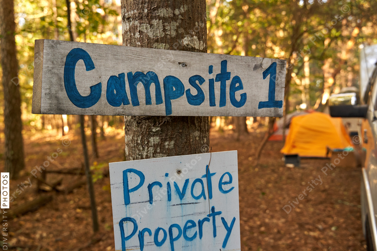 Campsite sign in the woods