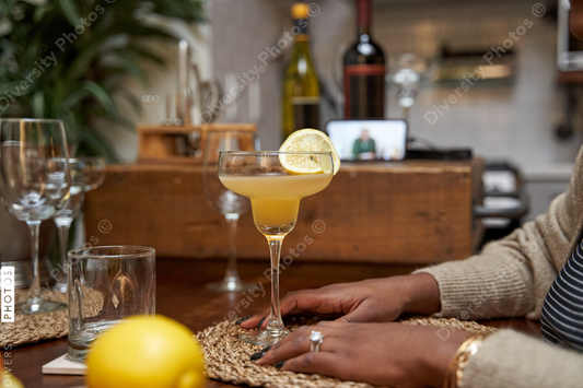 Black female hands and homemade cocktail drink