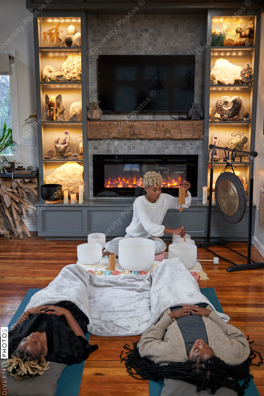 Black girlfriends enjoying a peaceful and relaxing sound bath meditation