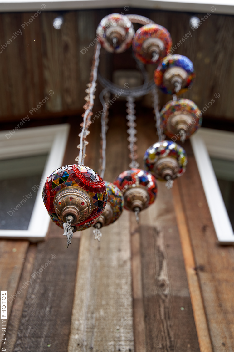 Unique wind chimes hanging outside home