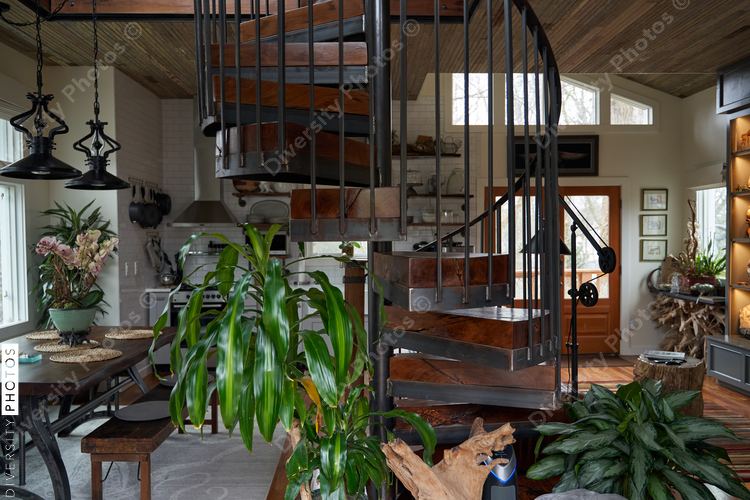 Beautiful interior home, warm and cozy earth tones, spiral staircase