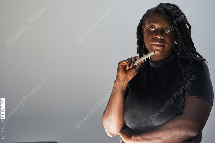 Portrait of Black female artist thinking about new concept