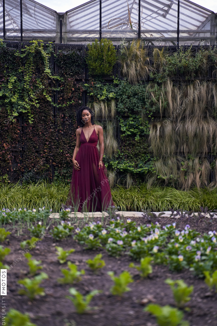 Portrait of African American woman in garden, fun