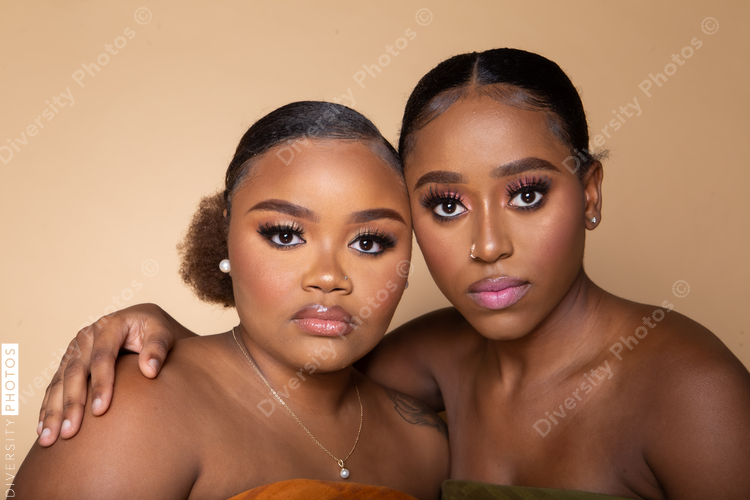 Female best friends studio portrait