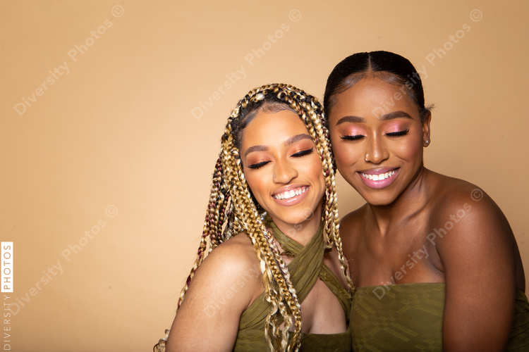 Female happy best friends studio portrait